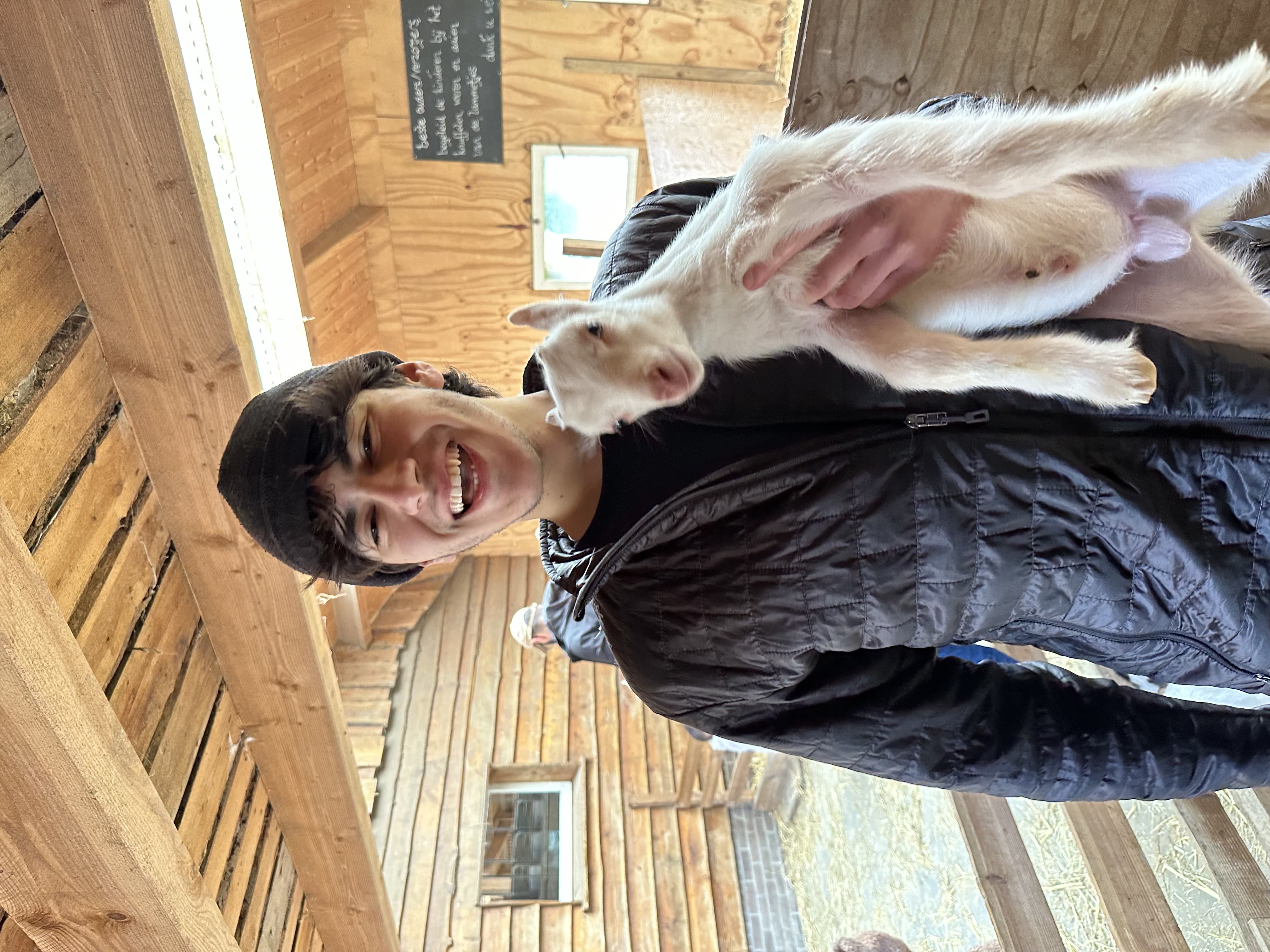 Picture of me, Andy, holding a goat.